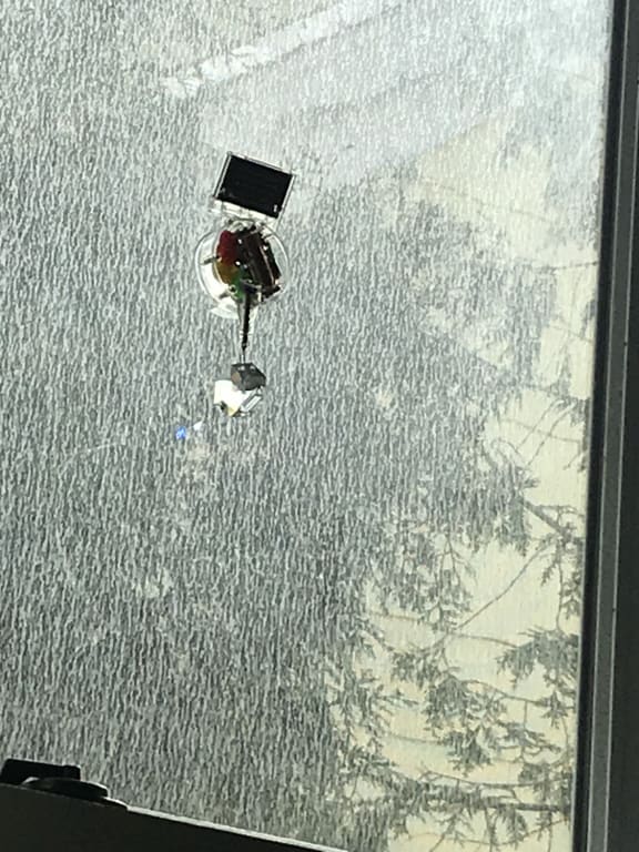 Solar Rainbow Maker Window Charm from Uncommon Goods. Customer submitted image.