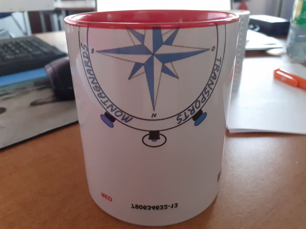 un mug mal imprimé dans le lot