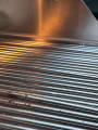 Warped grill grates