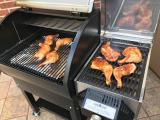 Low smoked leg quarters getting a kiss on the sear station