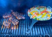 Direct flames and side of veggies cooked in castiron