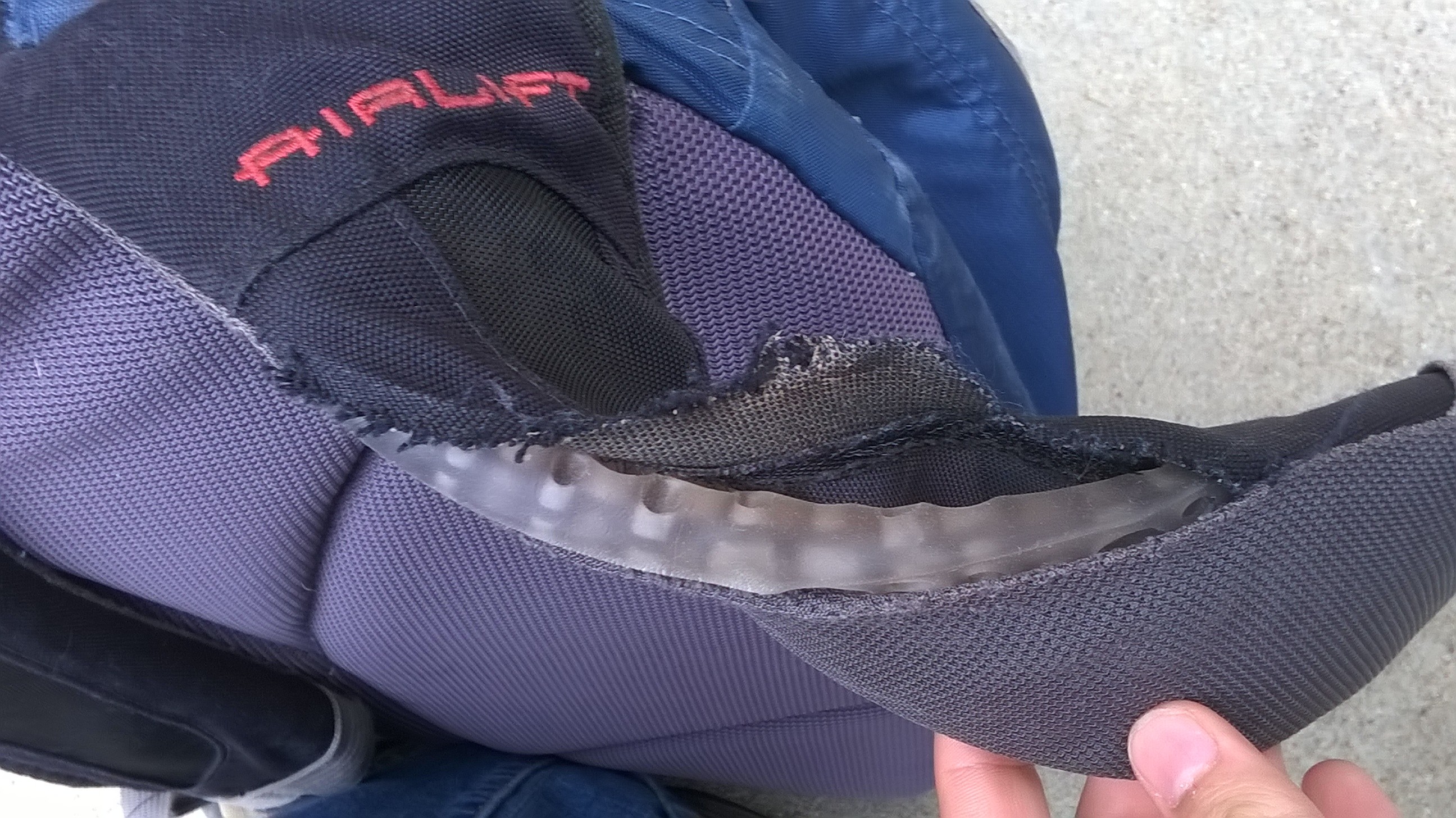 tear in sholder strap