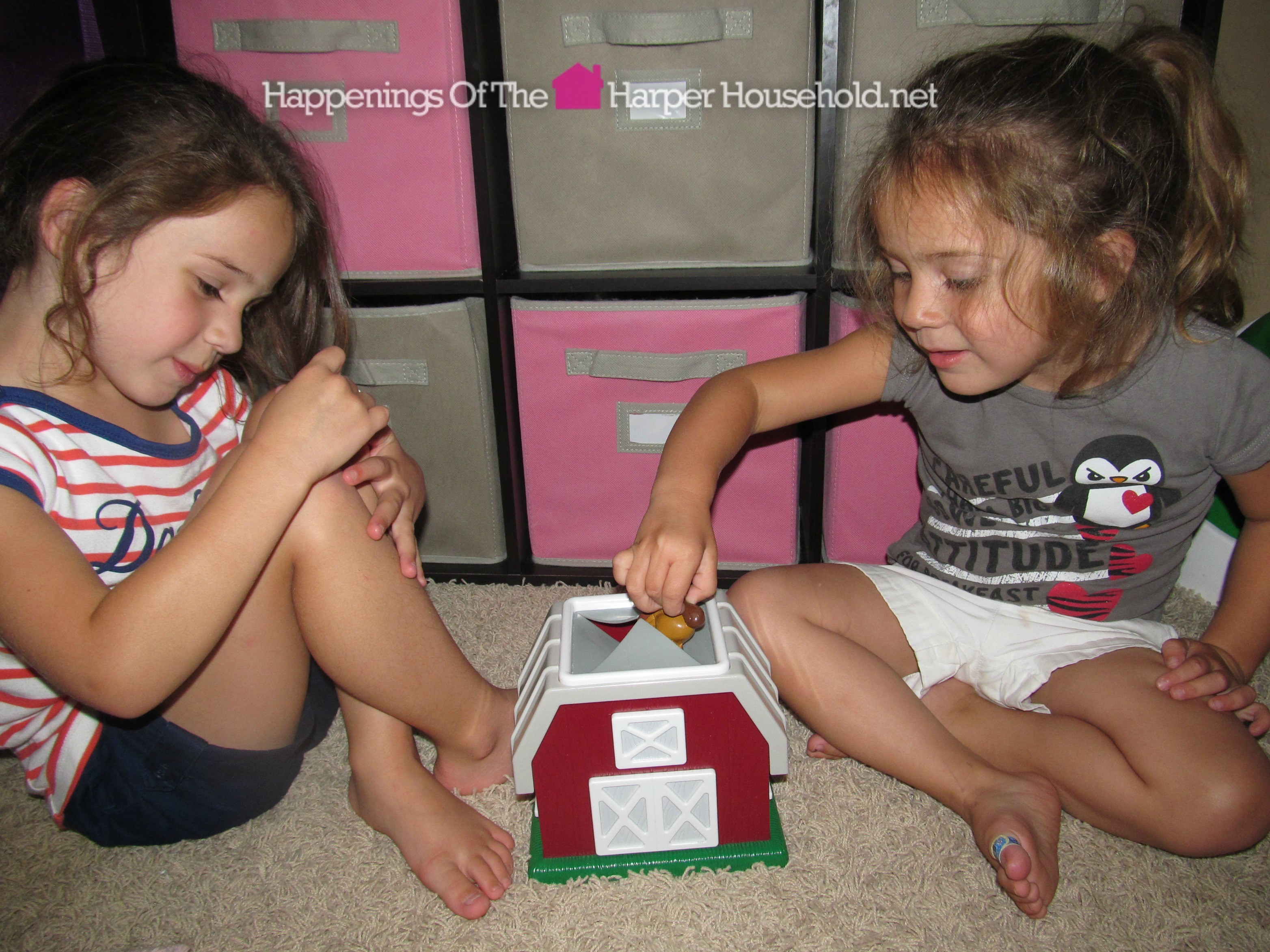 Sisters playing Hide-n-Go Moo