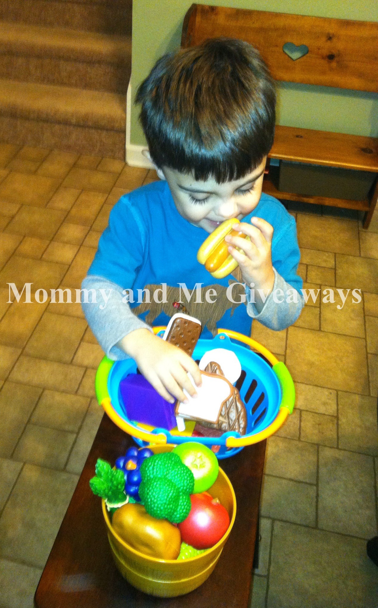 My son checking out the Deluxe Market Set