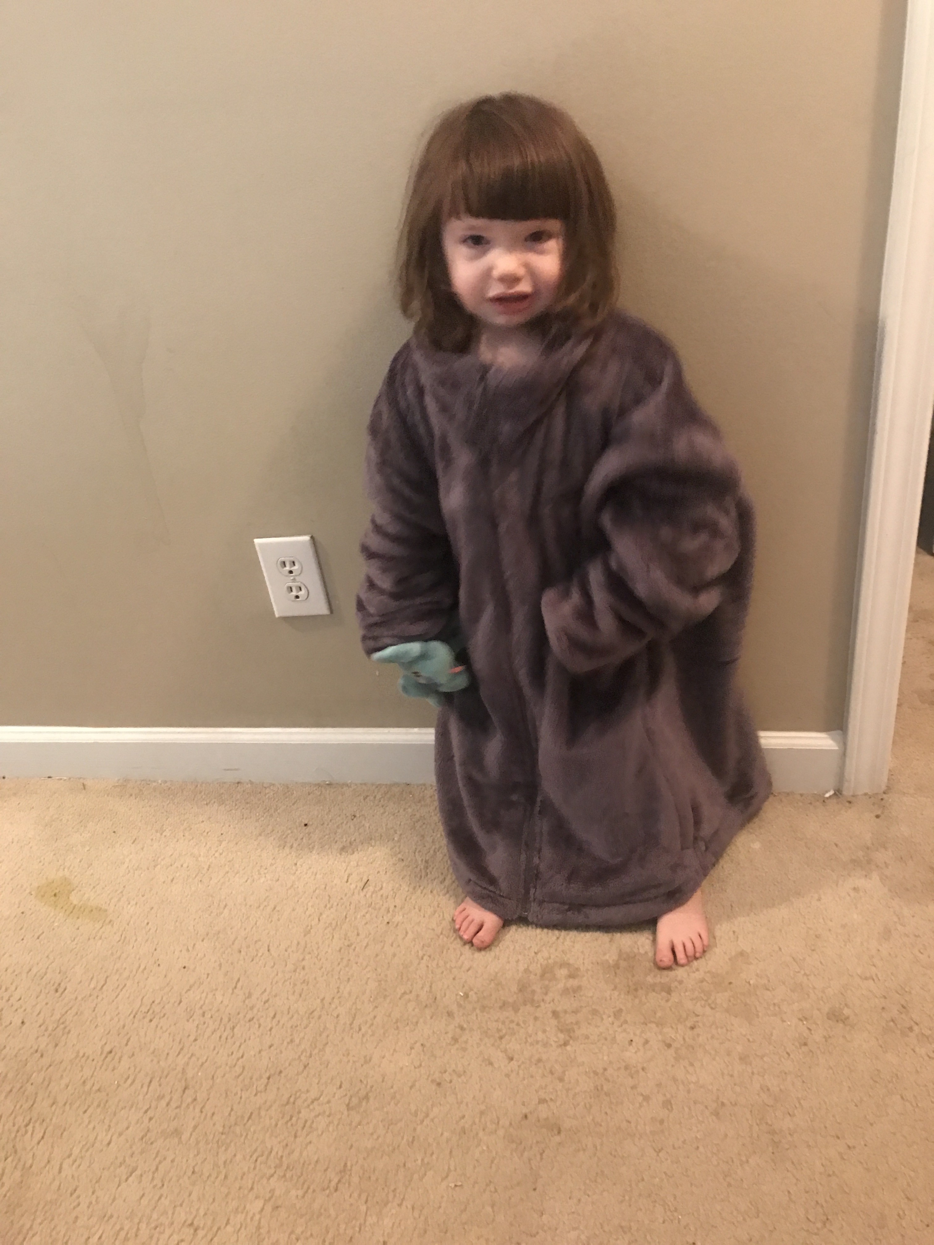 Mom caught me in her jacket.