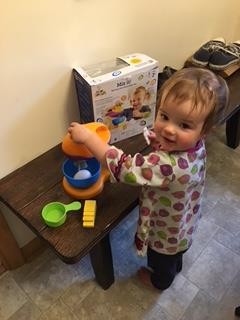 Trying to mimic the girl on the box.