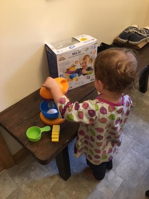 Twisting the blender knob.