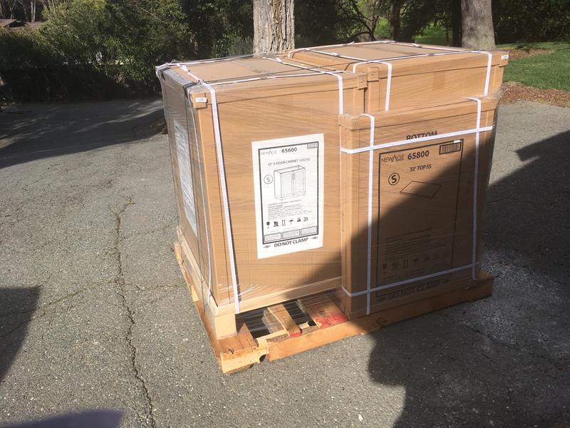 On a pallet with the Cabinets