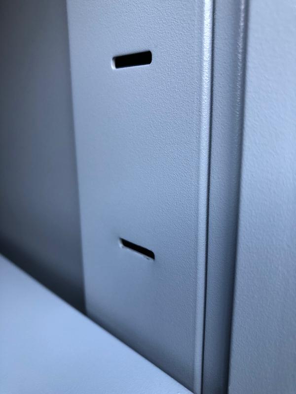 Damaged shelf tab slot