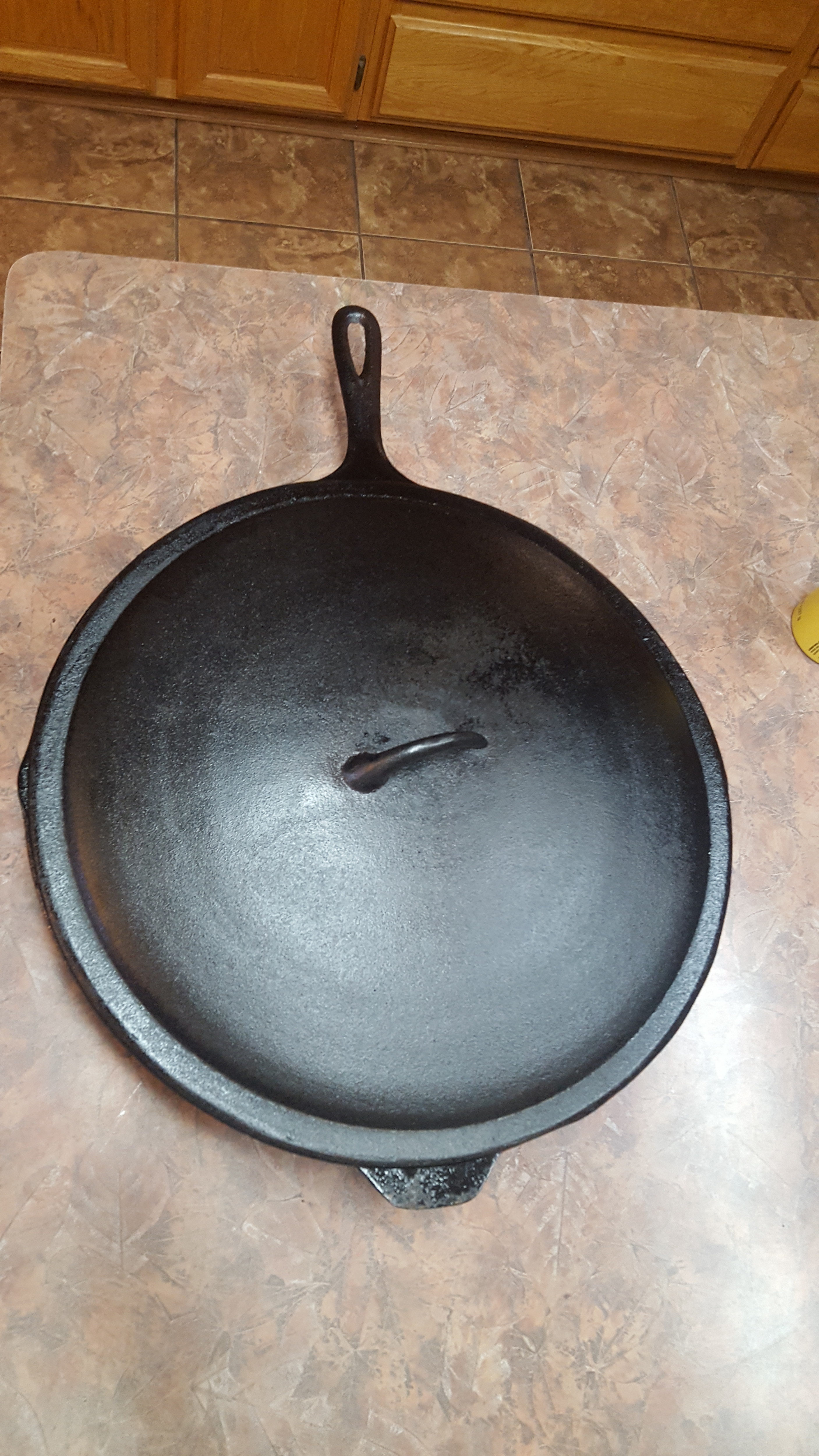 Lid Fits on this Skillet (Lid was seasoned more by my husband)