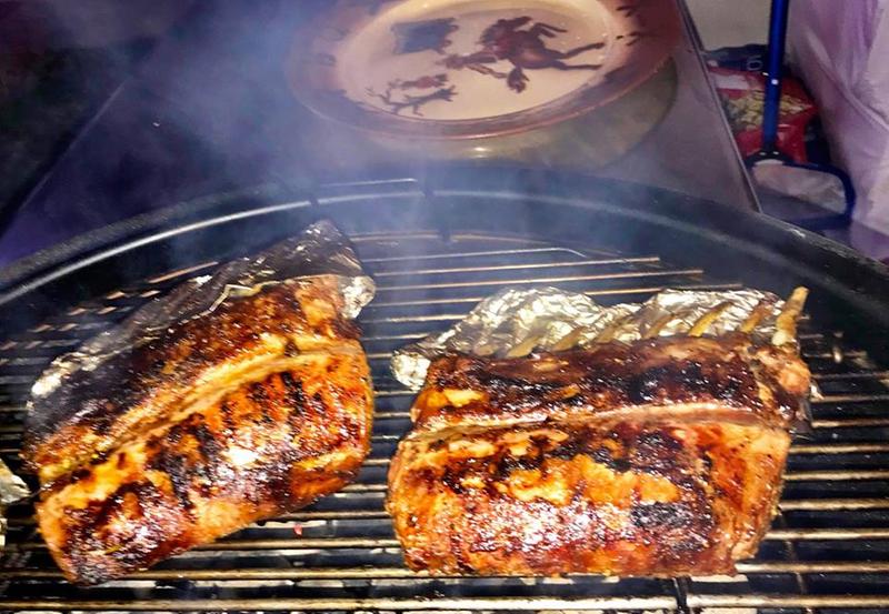 couple of rack of lambs on the grill, indirect for about 25 min, then seared for 2 min each side