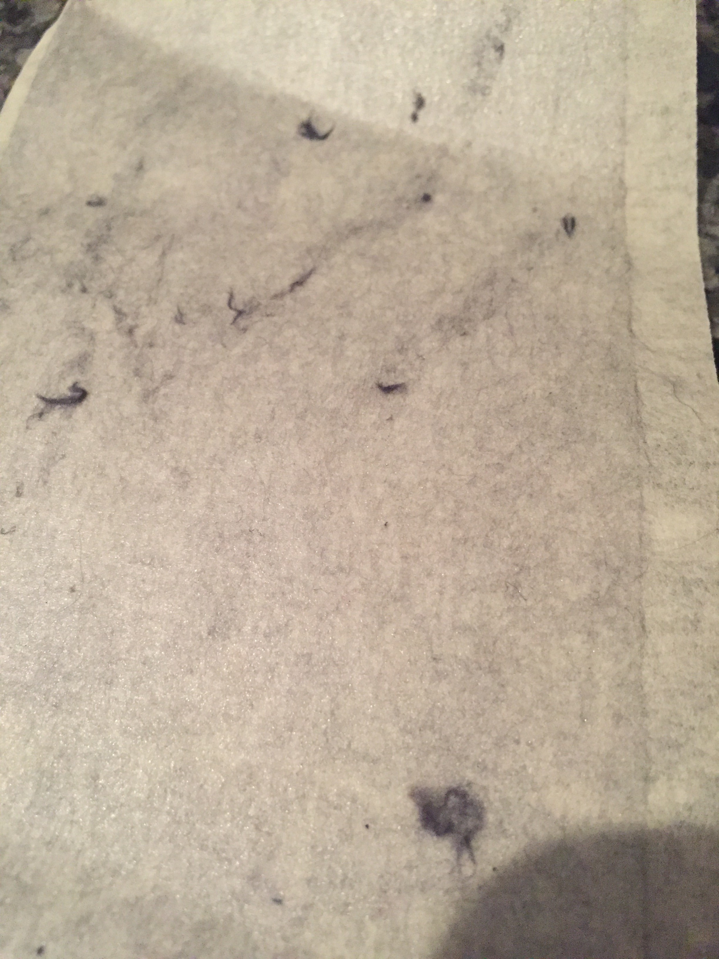 quick once over with a lint remover and all this fuzz comes off, especially around collar and edges.