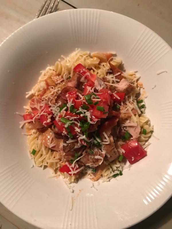 Chicken thighs over pasta