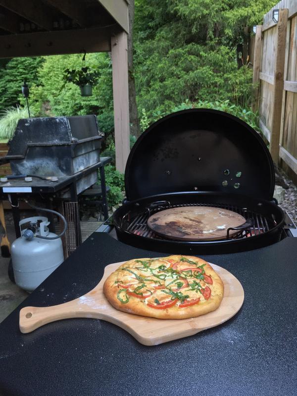Awsome pizza! (Note the 23 year old gas Weber in the background.)