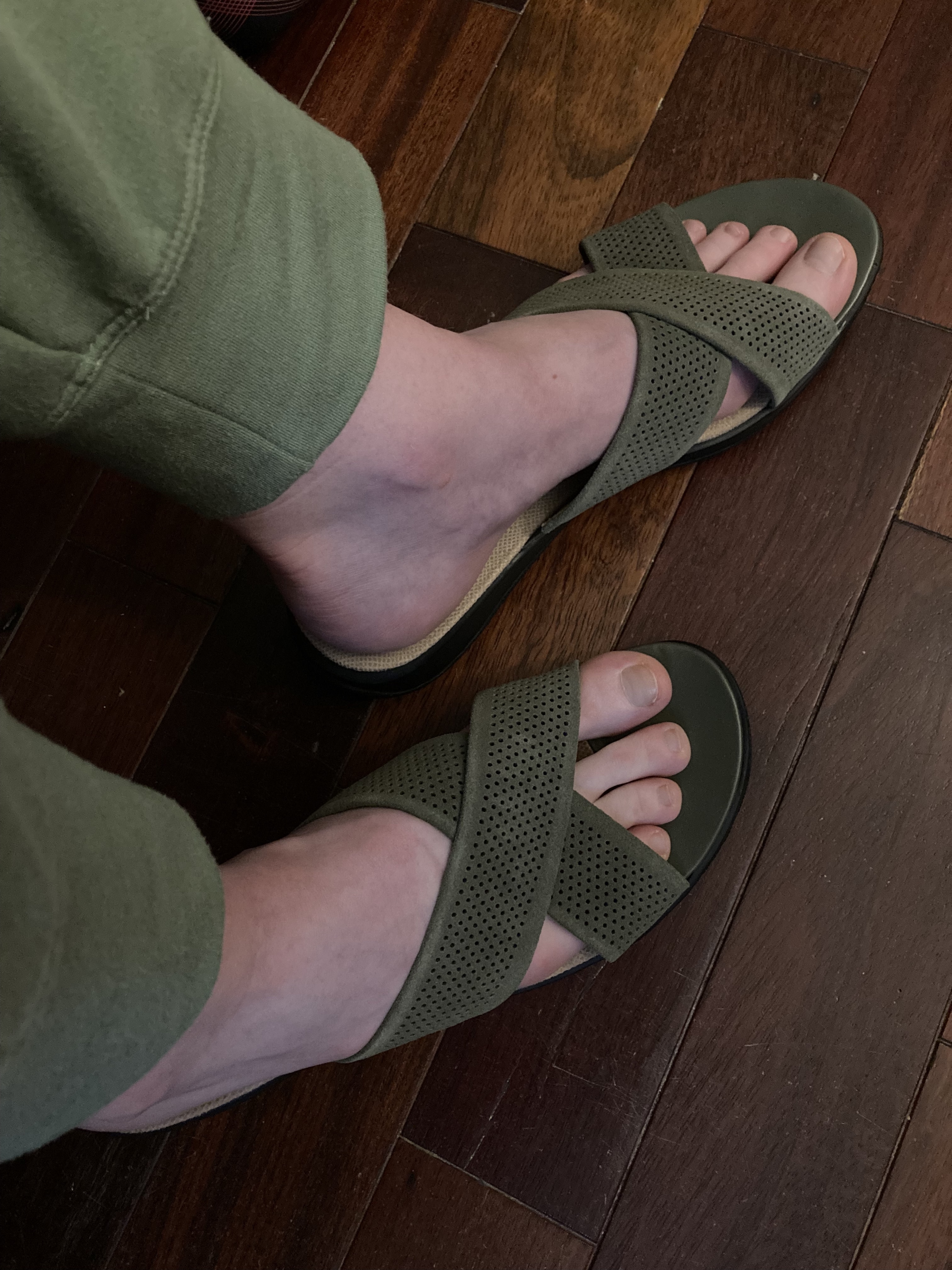 Green Tillman 12AA with gaping angled straps around the ball-of-foot