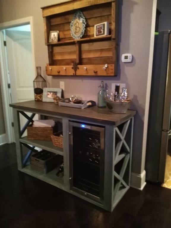 When your husband buys you a wine cooler for your birthday, you have to build it a home! :)