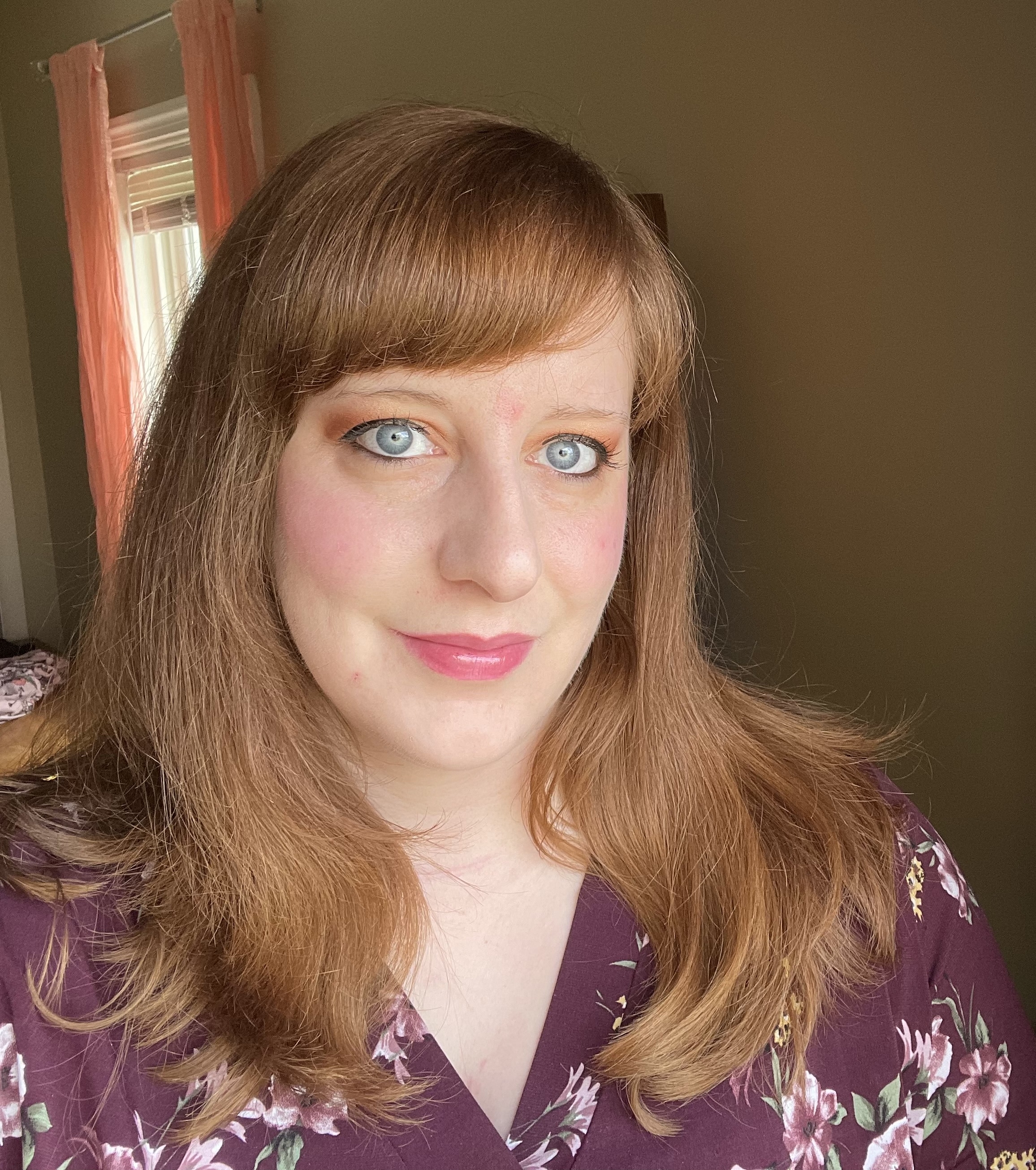 Guava Glow on cheeks and lips.