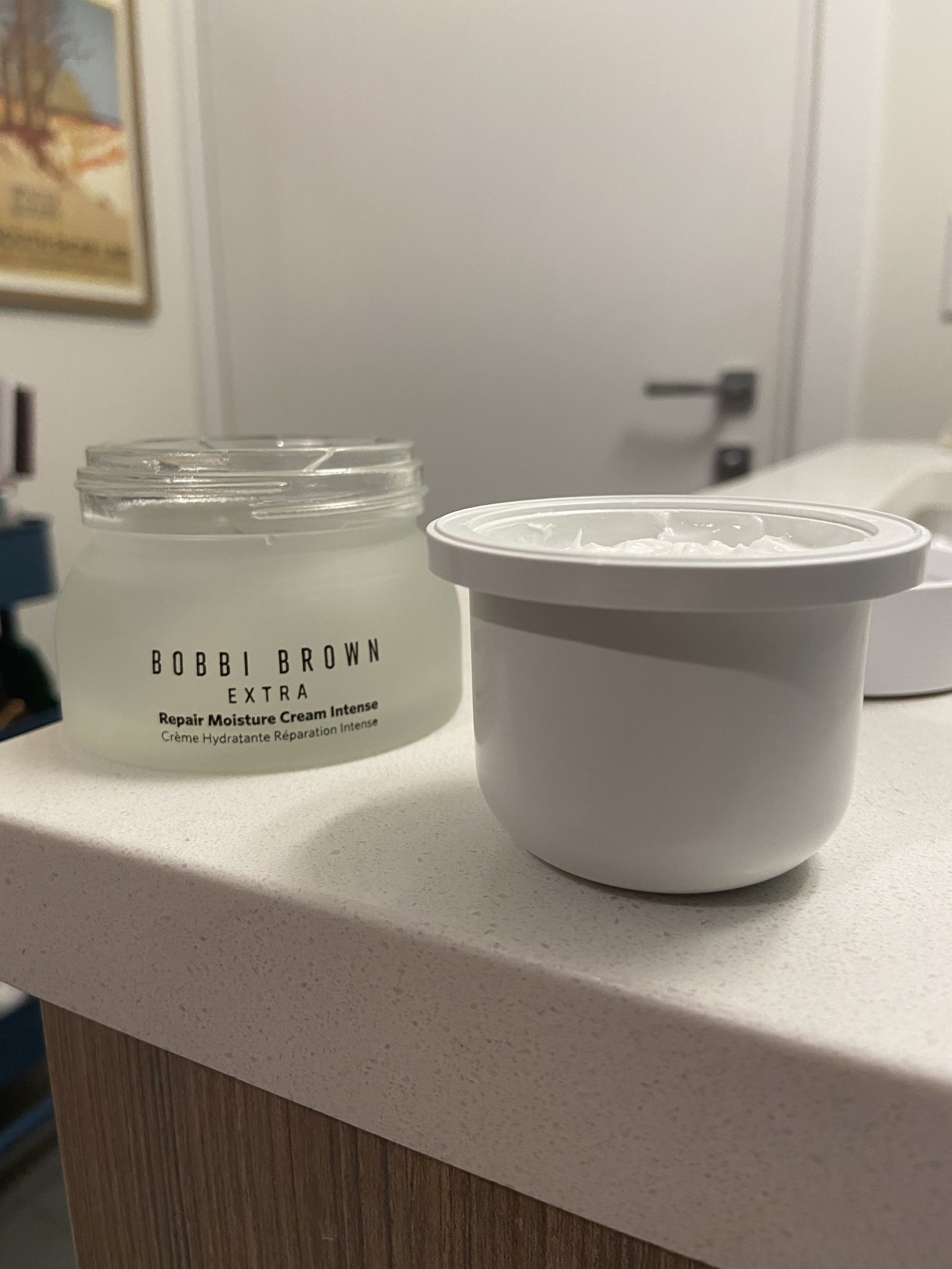 The refillable pot of product within the jar container