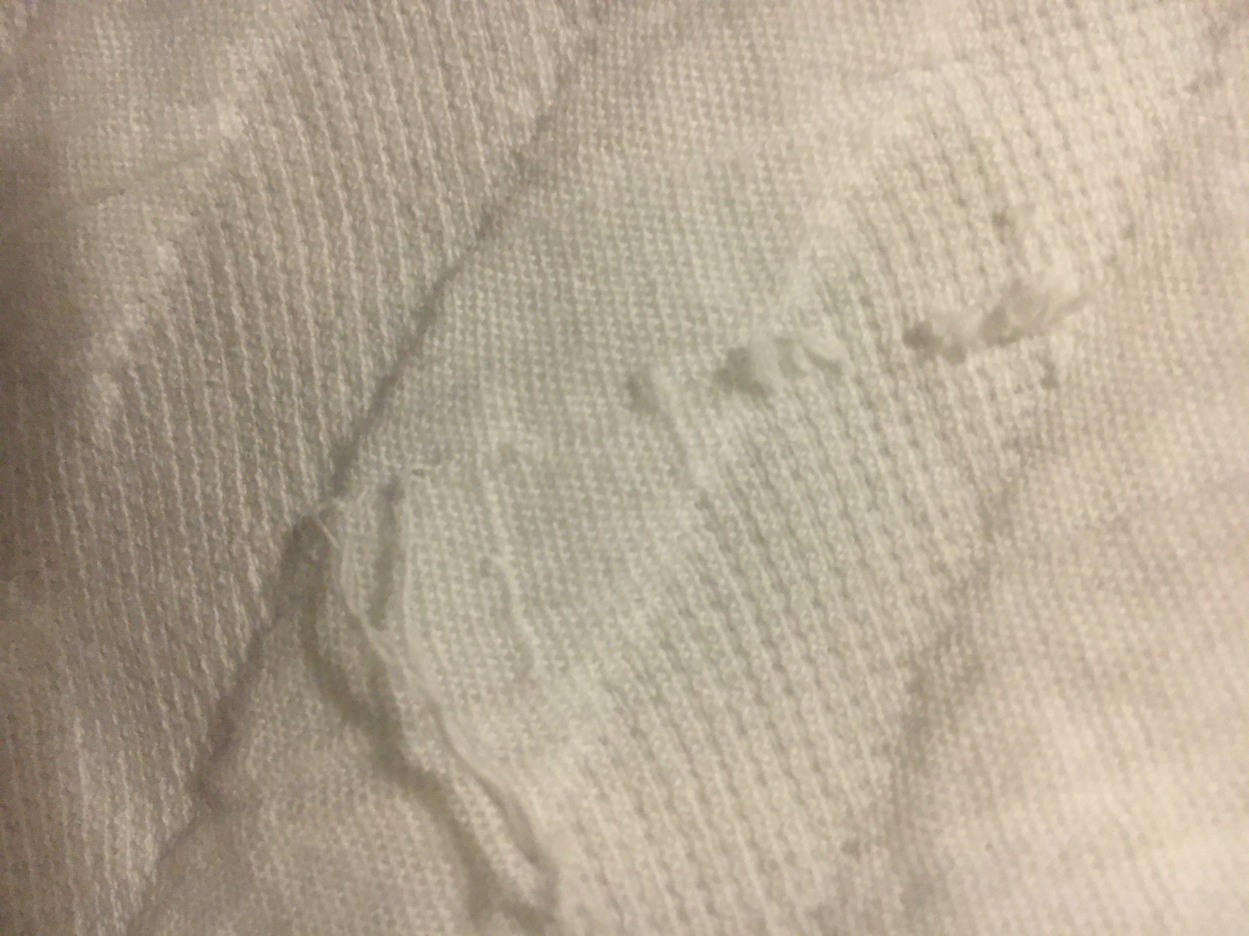 Unfortunate snag or pull : (could have been shipping damage)