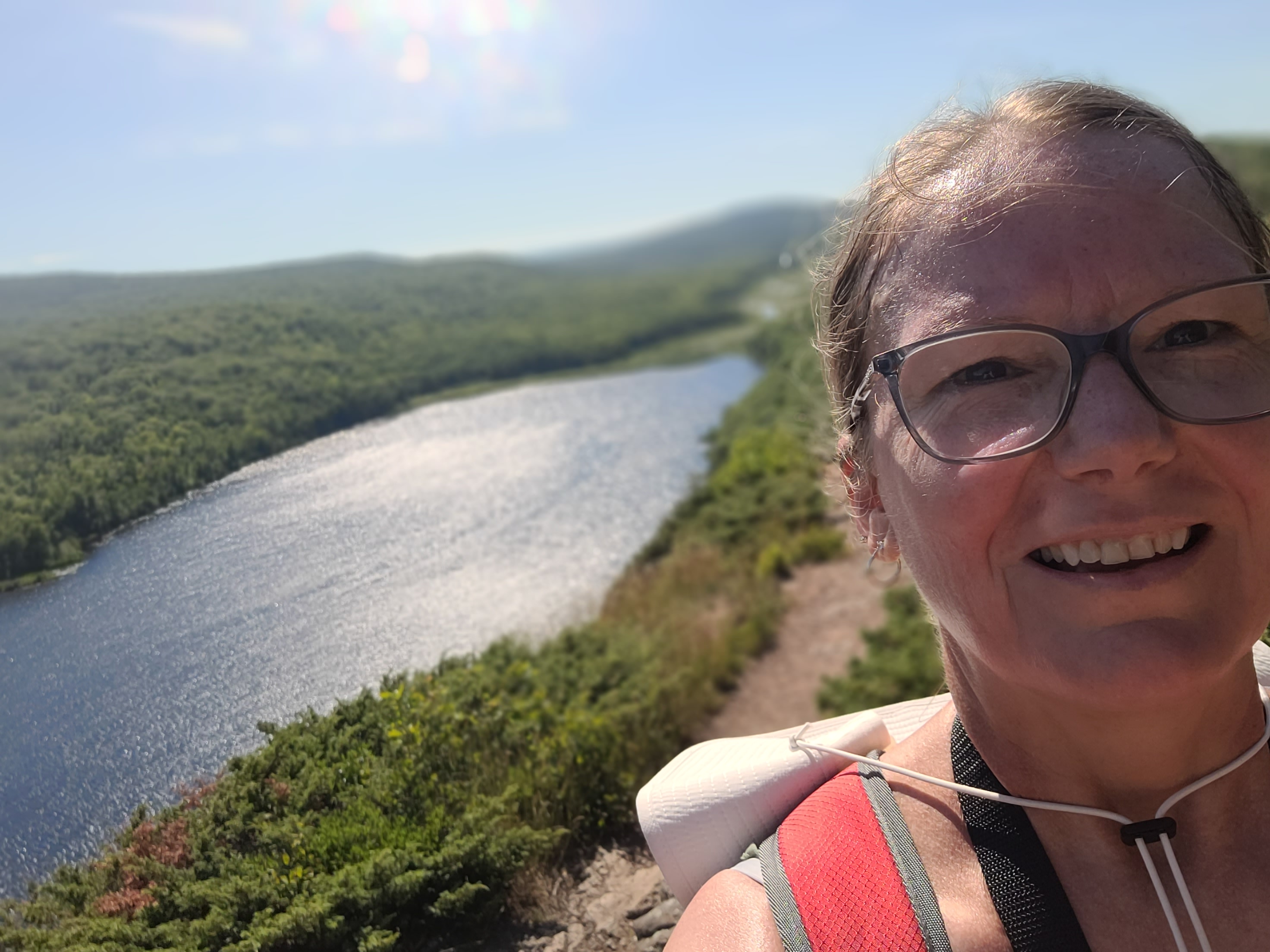 It has a lovely adjustable strap, so no hands necessary to hold tight at the top Overlooking Lake of the Clouds!