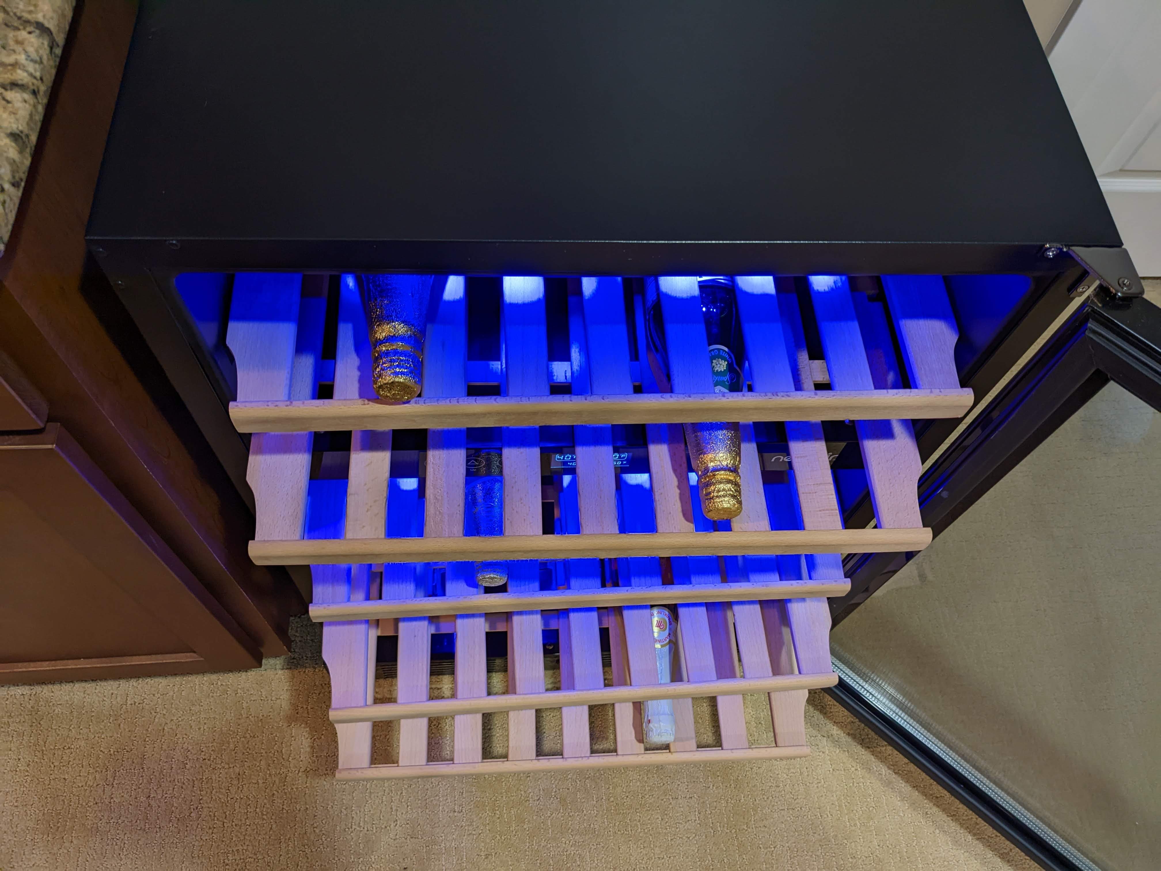 The wood shelves pull out making it easier to add your wine and take the bottles out to use.