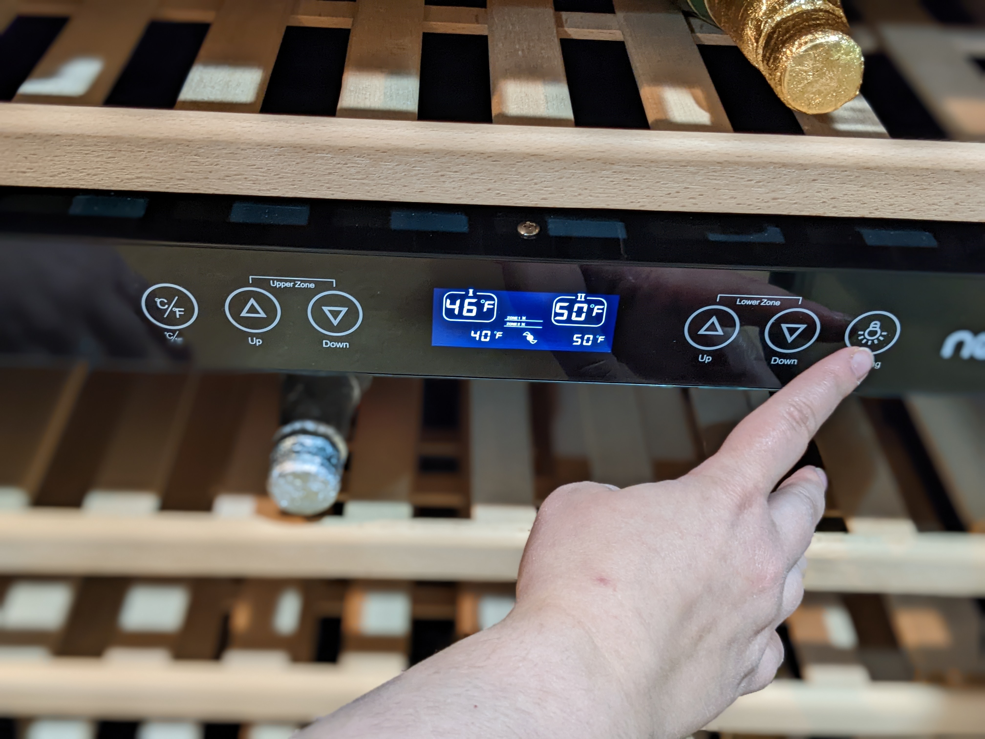 You can set the blue back light between High, low and off with the lightbulb button.