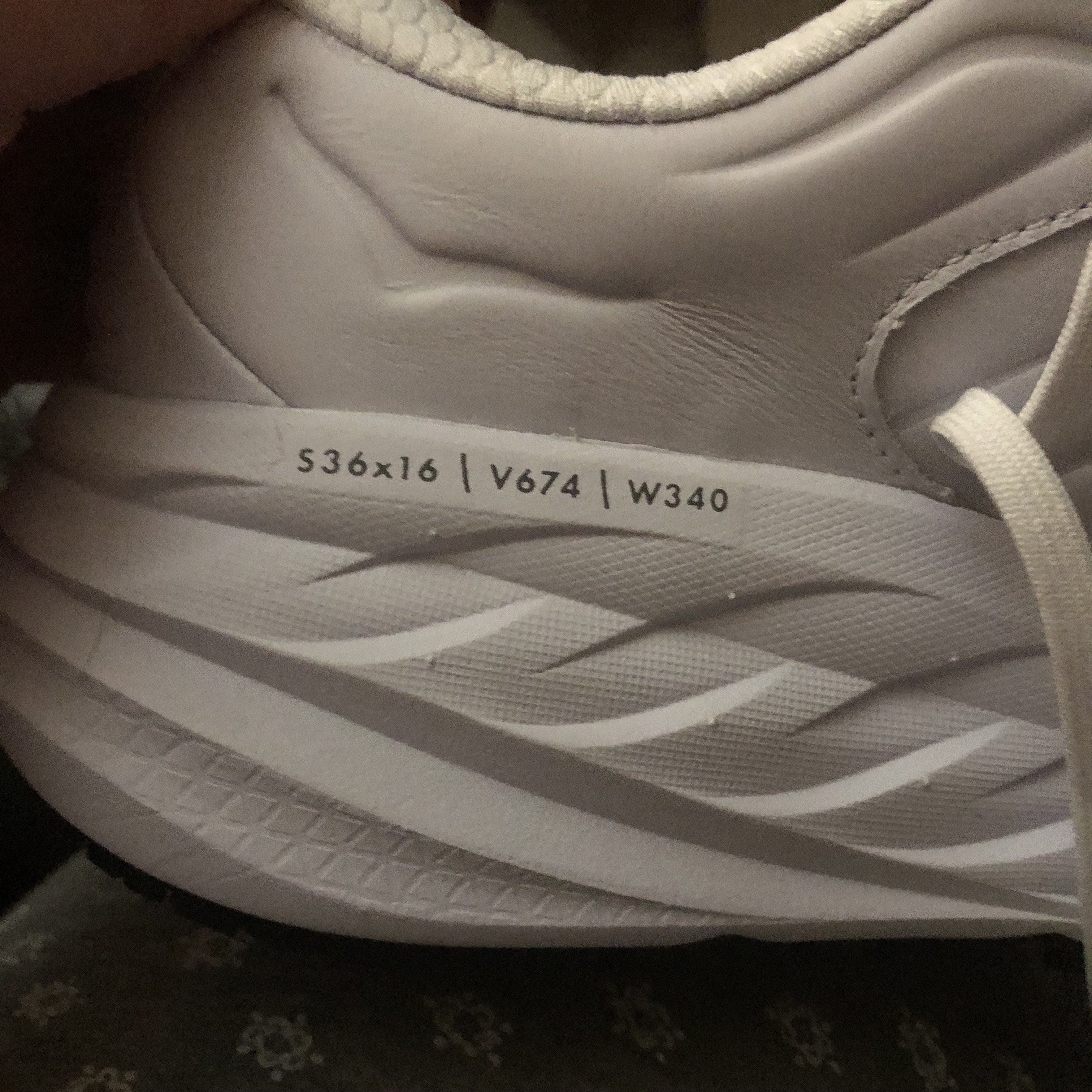 What's up with this lettering on the sole of a WHITE SHOE?