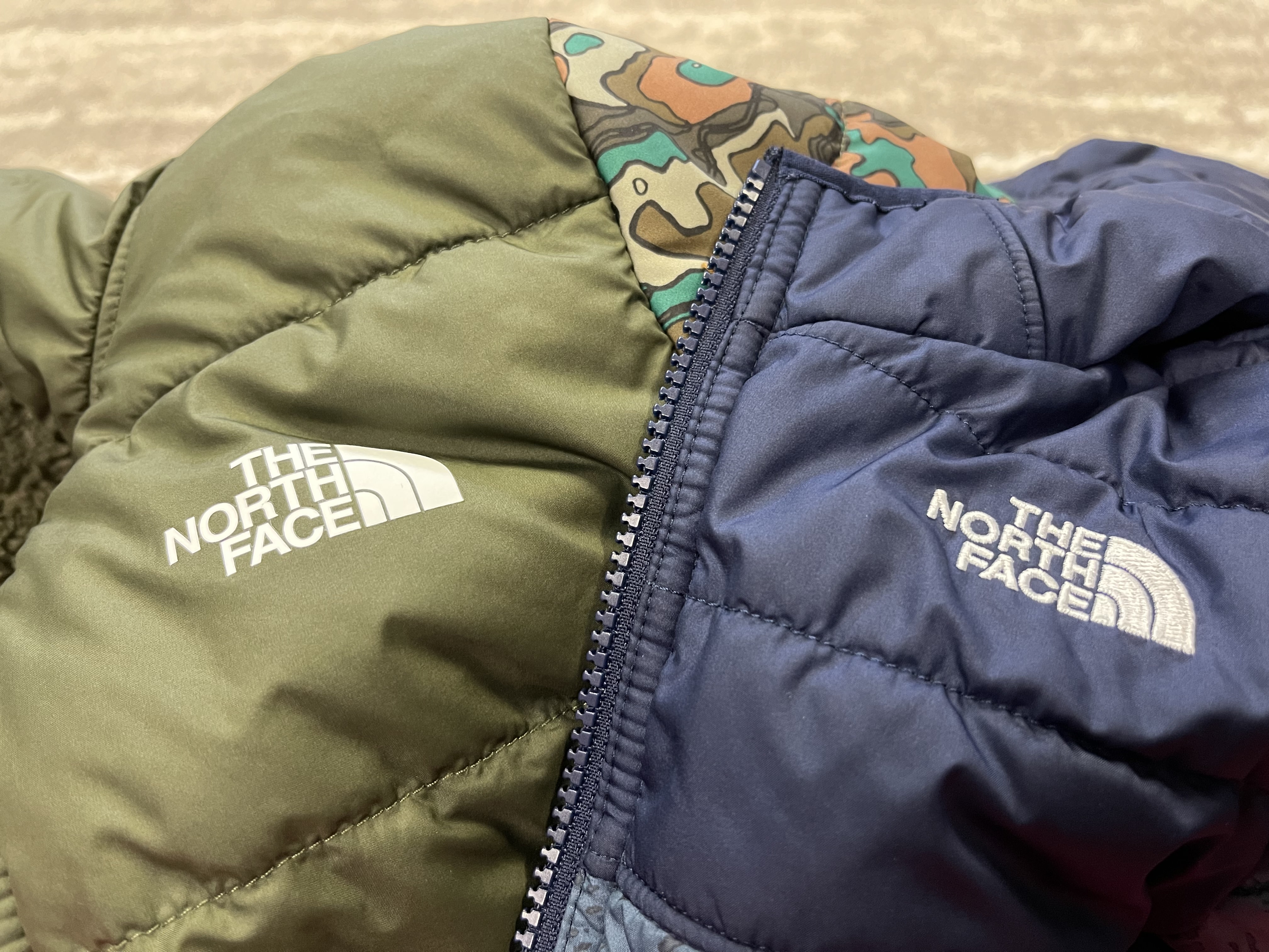 Blue is previous purchase with logo embroidered.