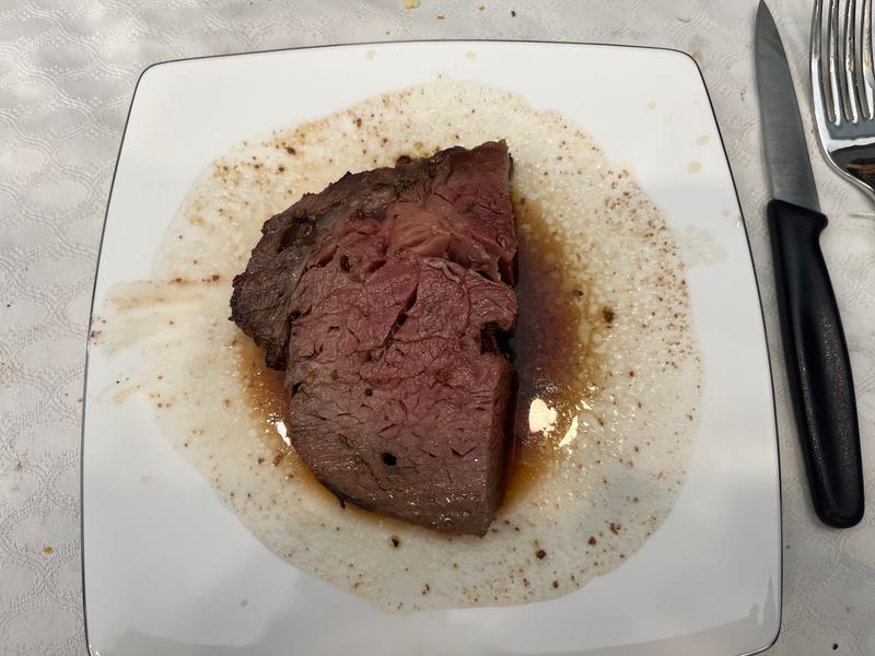 Plated slice of the prime rib