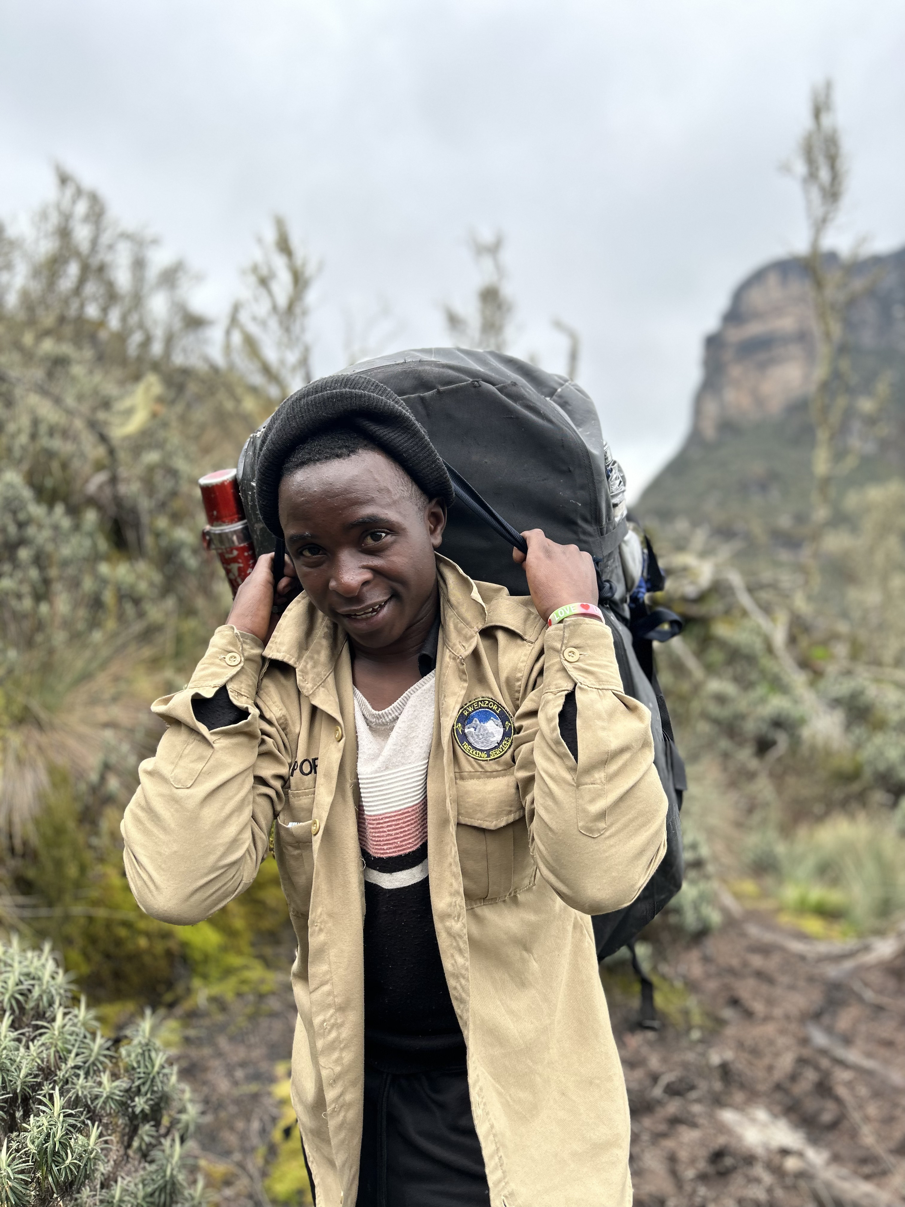 TNF duffel carried by porters in the Rwenzoris of Uganda during our 10 day expedition to Mount Stanley, Speke, and Baker.