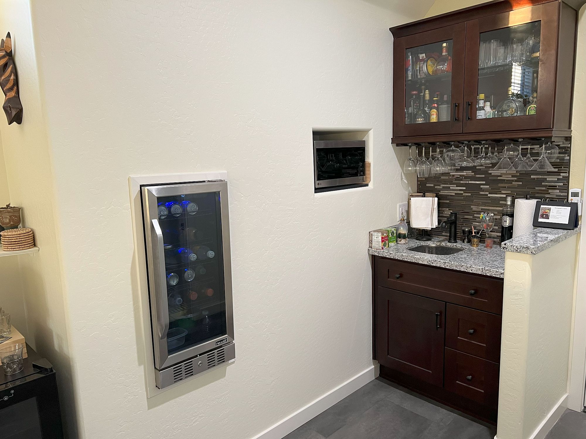 Built into the wall which had several feet of dead space behind it.