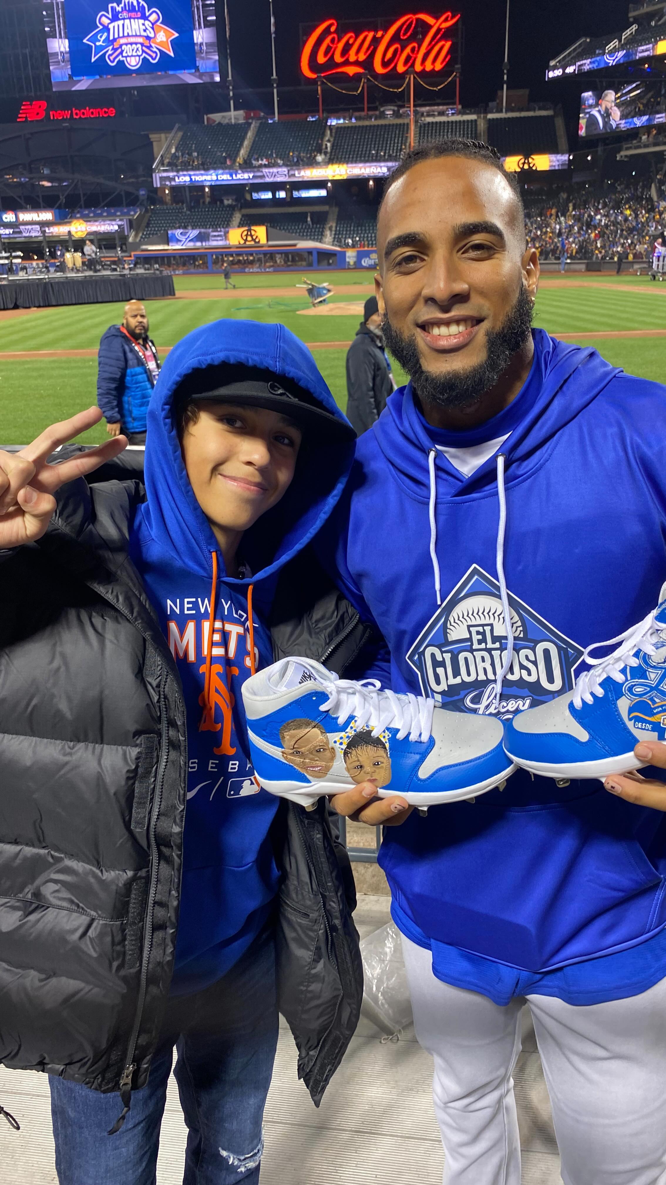 Me at Citifield with Adonis Medina and the cleats I painted for him! Looking cool in my Northface HMLYN Down Parka