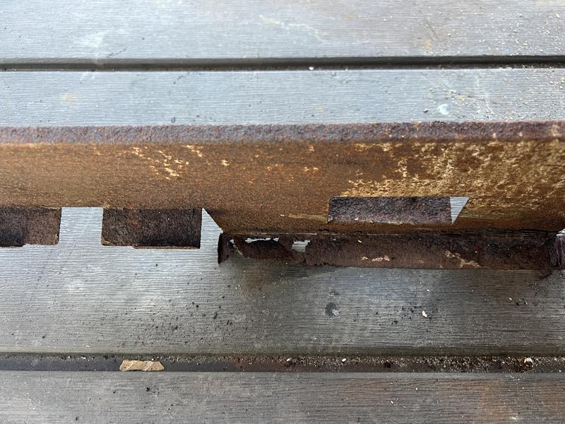 Rusted Rail that holds "flavorizers"