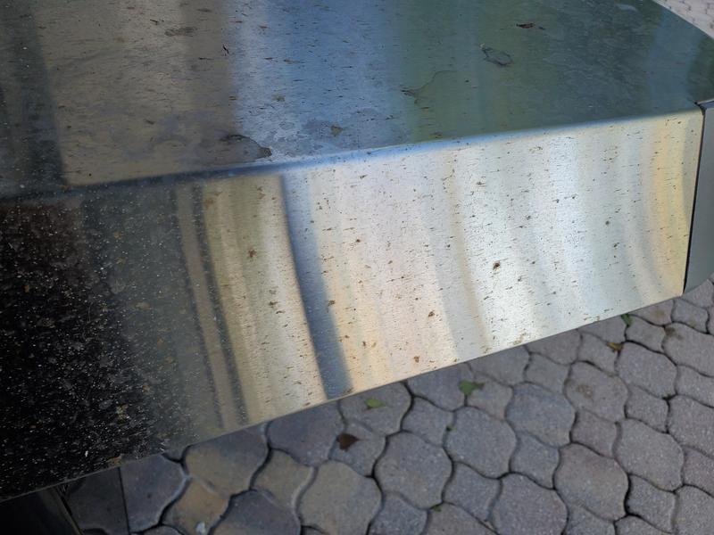 Rusted surface started after 3 weeks. This is at 6 weeks old. We had a windstorm, so it's dirtier than usual, but that's a rare occurrence, and our old, 2011 Genesis grill, that we loved so much, still doesn't have rust marks.