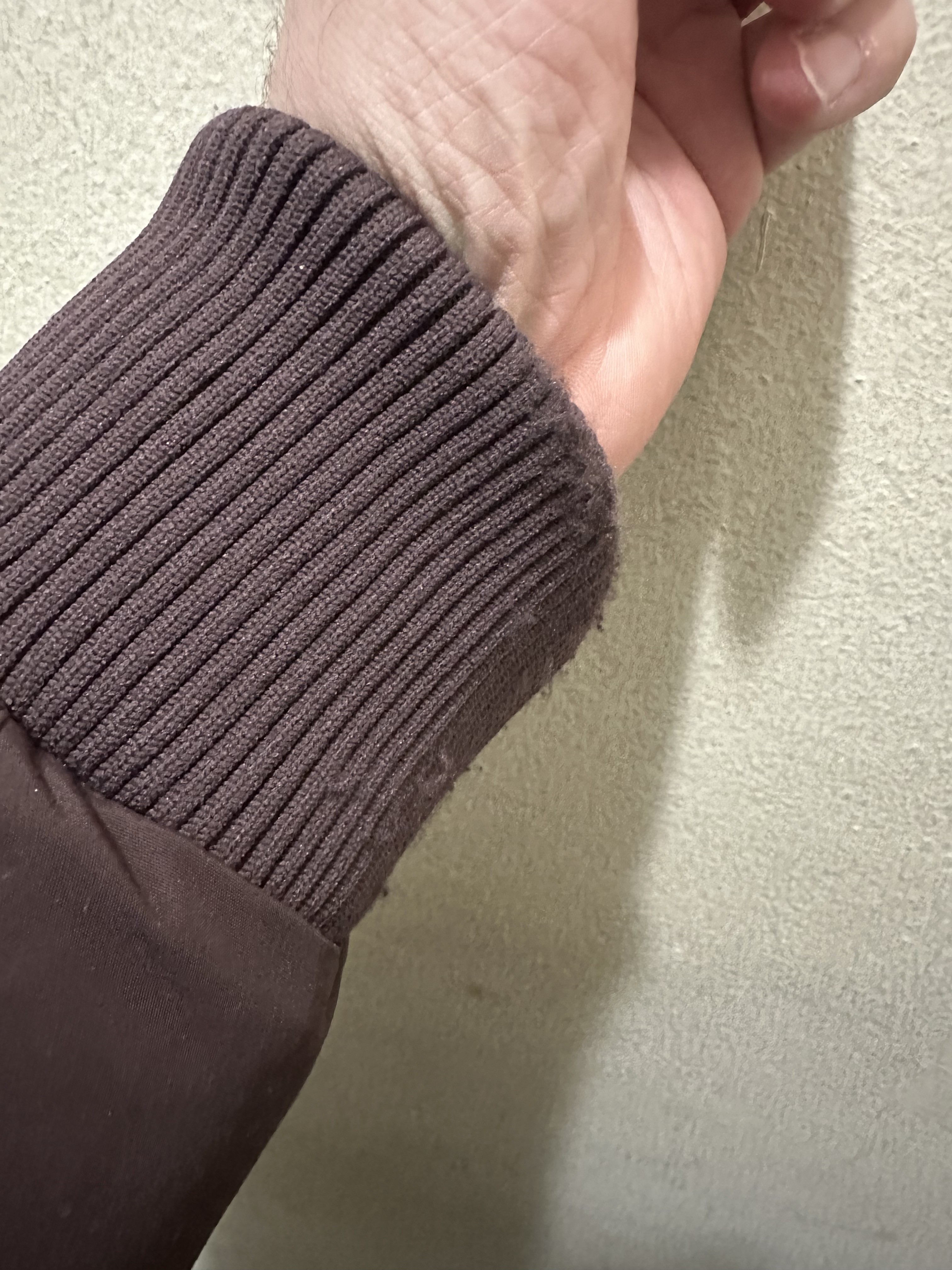 Frayed cuffs due to Velcro closures.