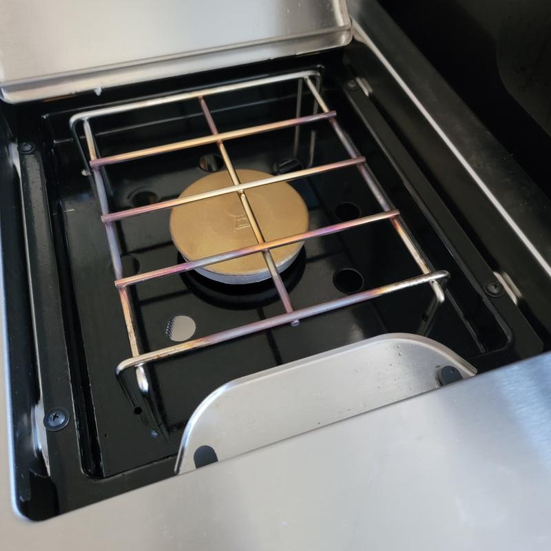 Recessed tool hooks are not OXO tong friendly, But side burner is excellent!