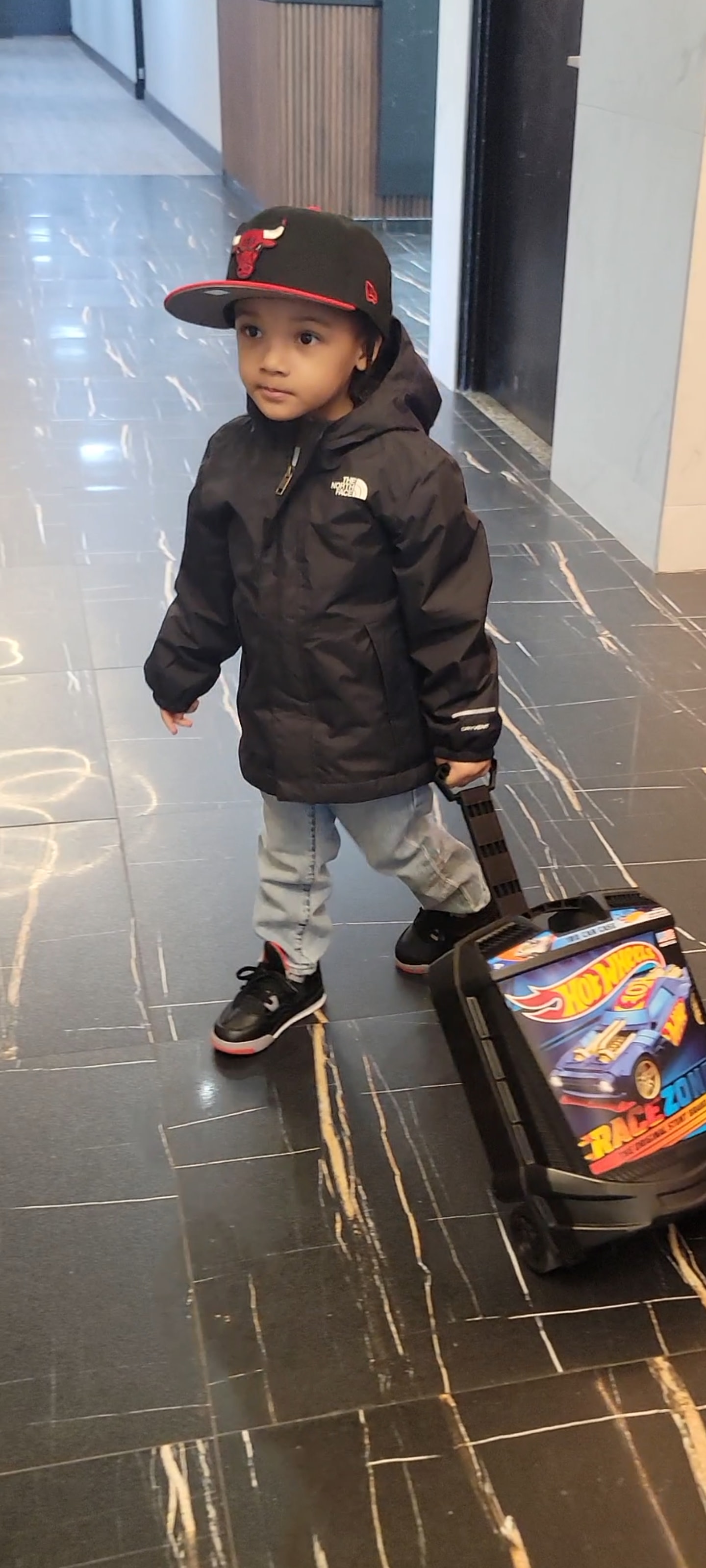 3 year old in tnf Antora Rain Jacket