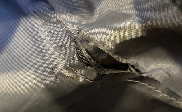 interior pocket seam, items drop into large pocket