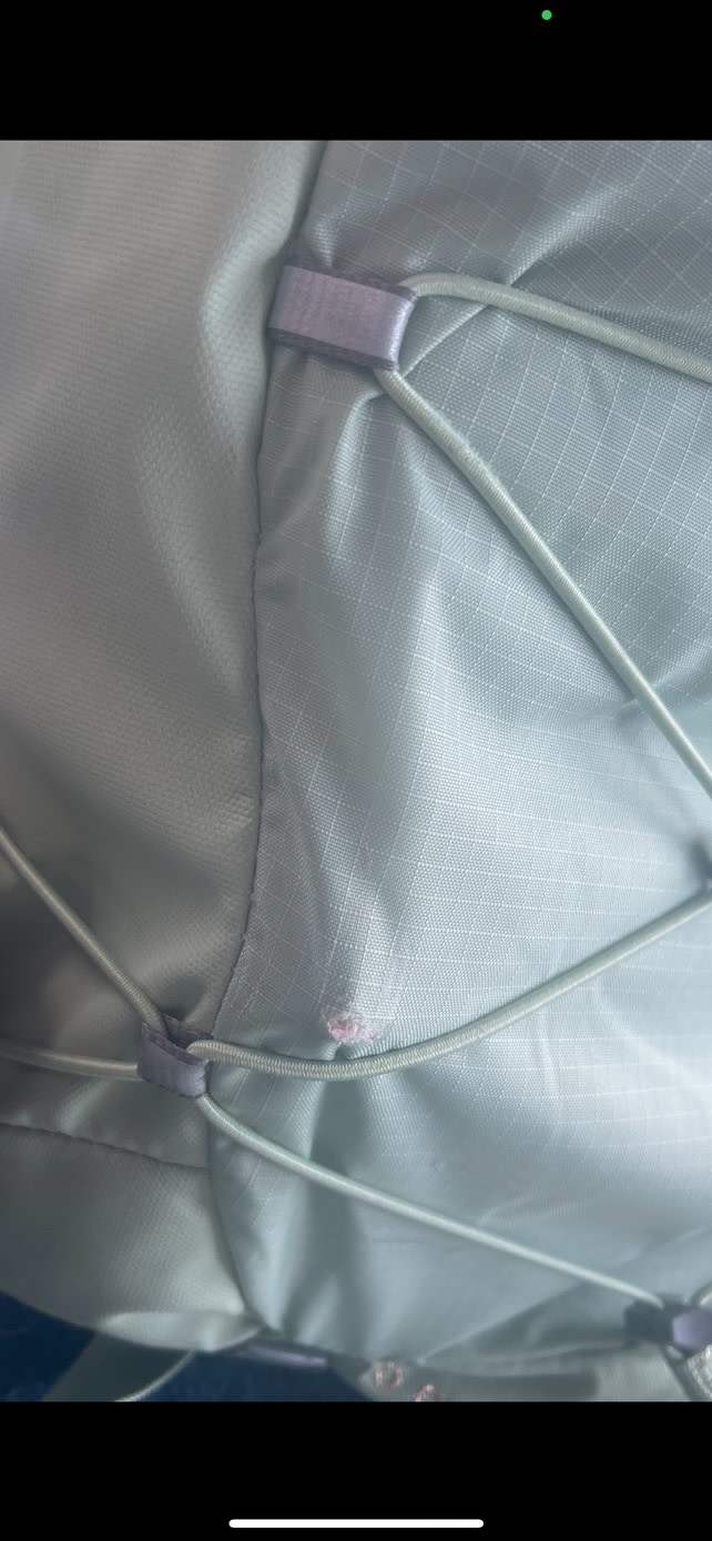 Books rubbed a hole, not even two weeks