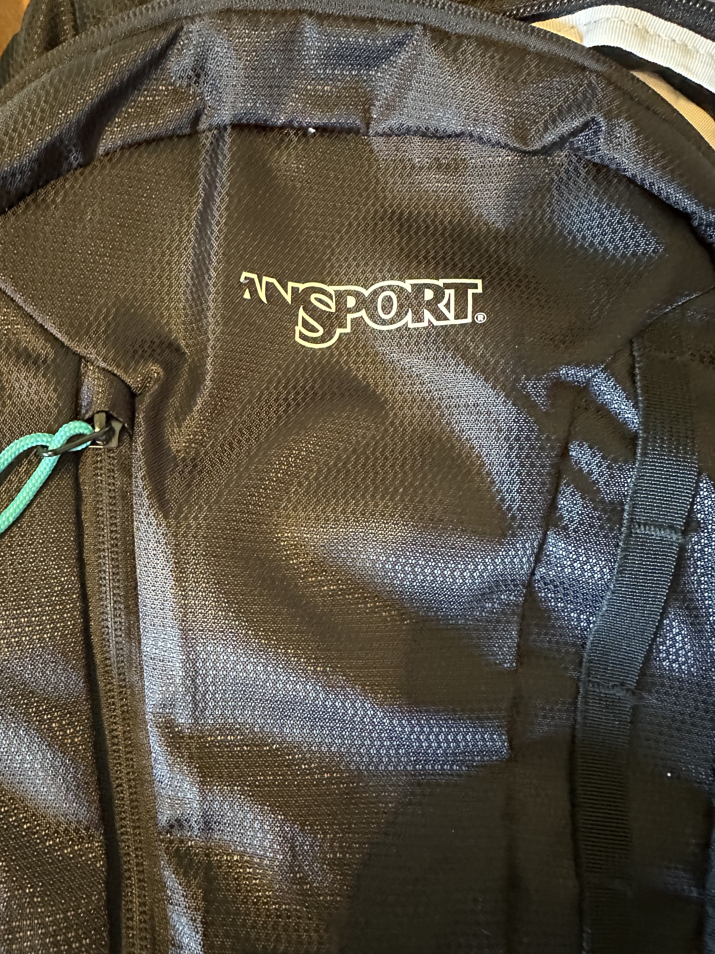 I've had this backpack for under a year. I love the backpack the only problem is the lettering of Jansport is pealing off the bag.