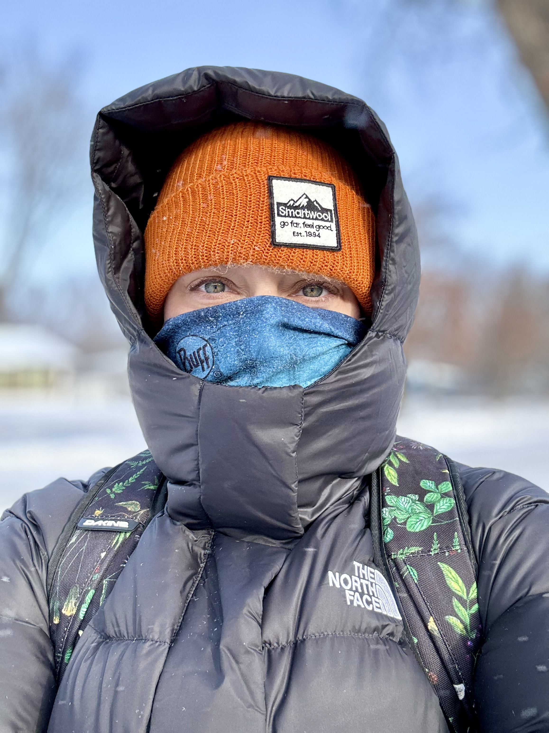 Hood blows back in wind