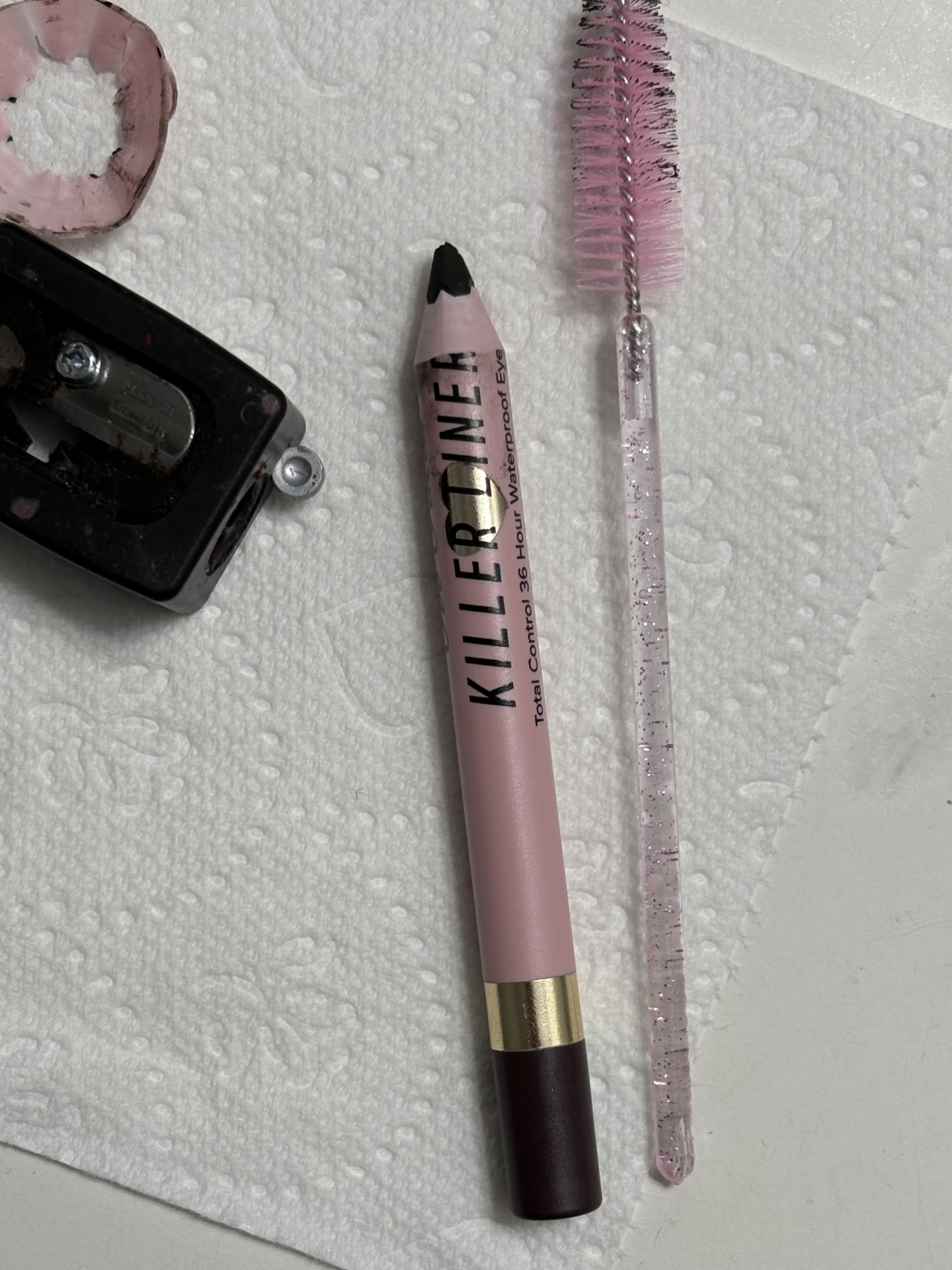 Mascara wand to show how I've worn it down by sharpening it