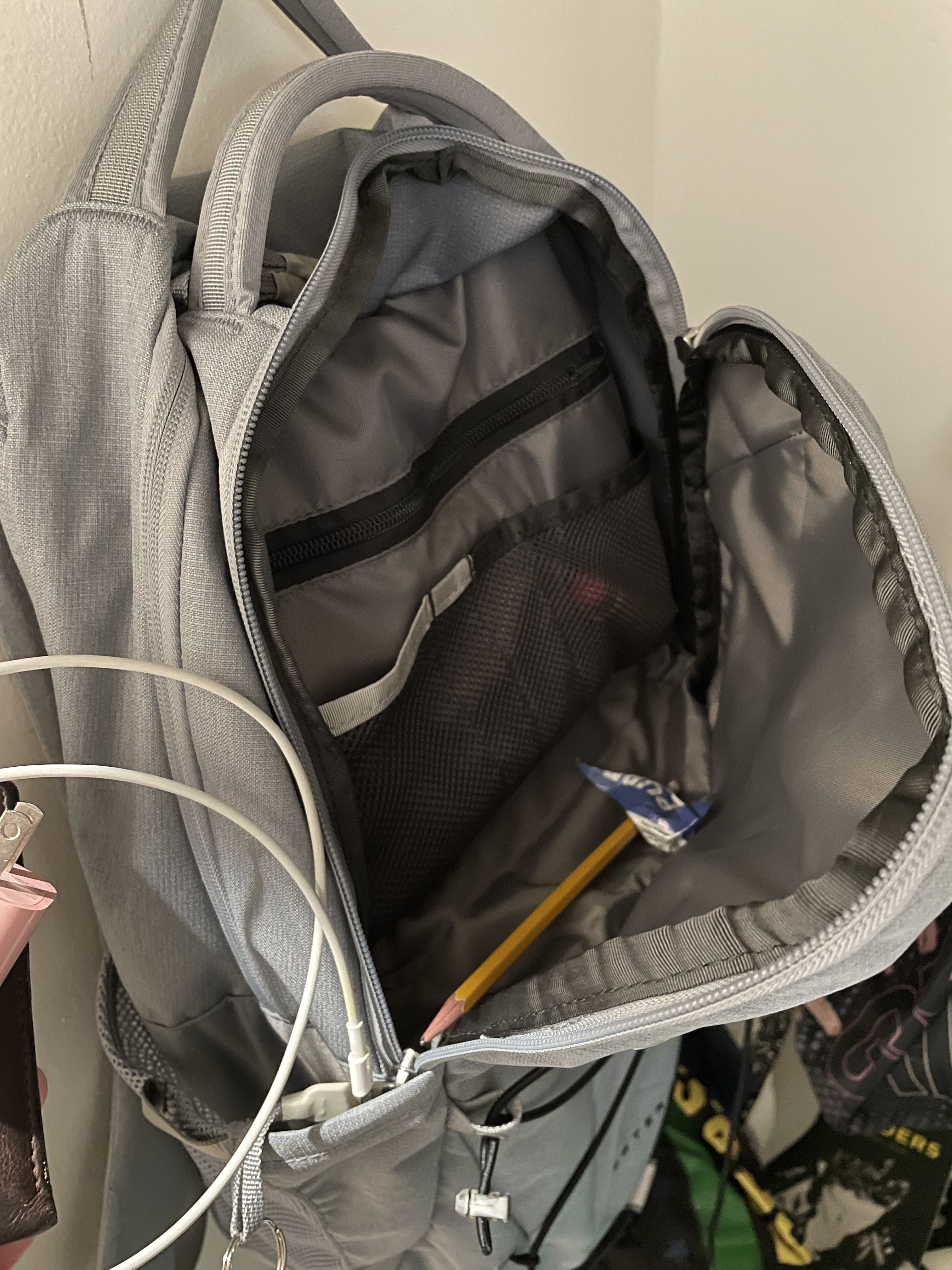 front pocket is only half the length of the backpack