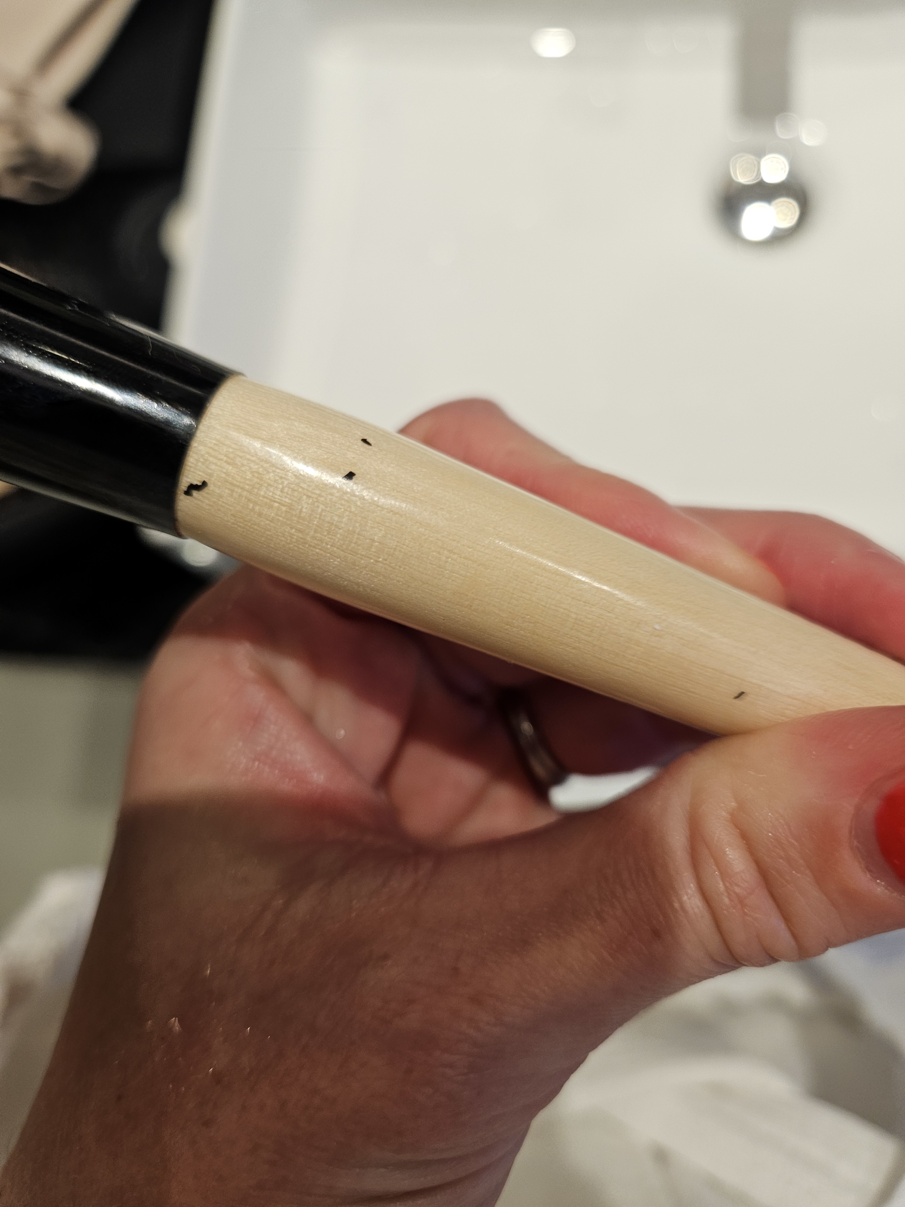 black specks all over my make up in my make up bag