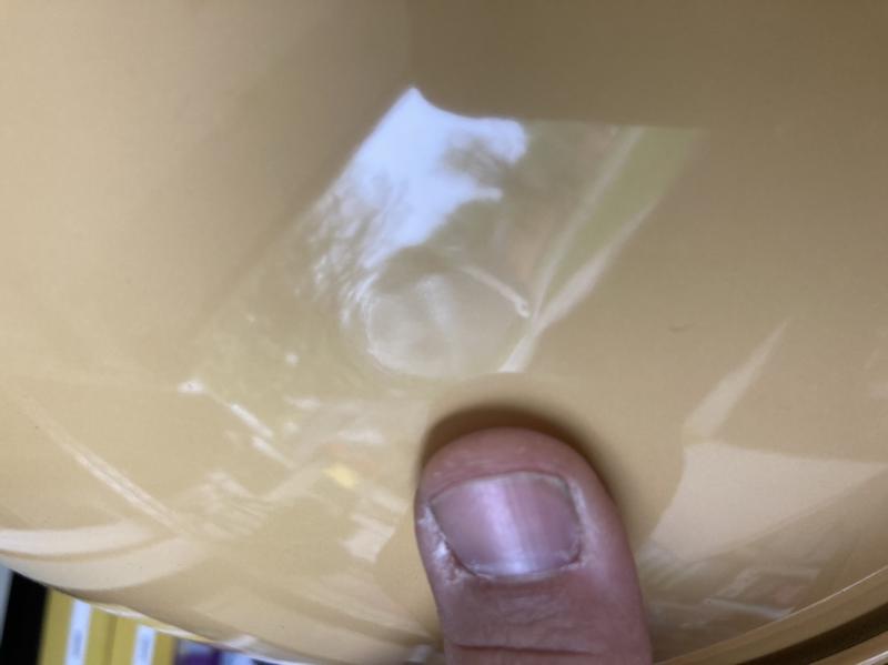 Dents at the weld strap locations