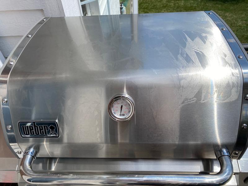 This won't burn off. Won't clean off. Won't be scrubbed off. I'm stuck with a grill that looks like this from the film. Store won't let me return.