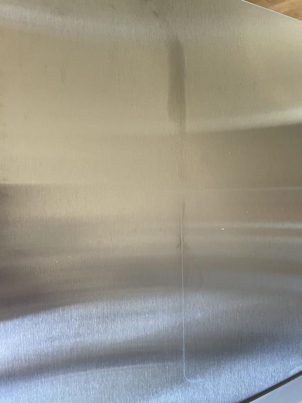 Blade cut in stainless steel side table