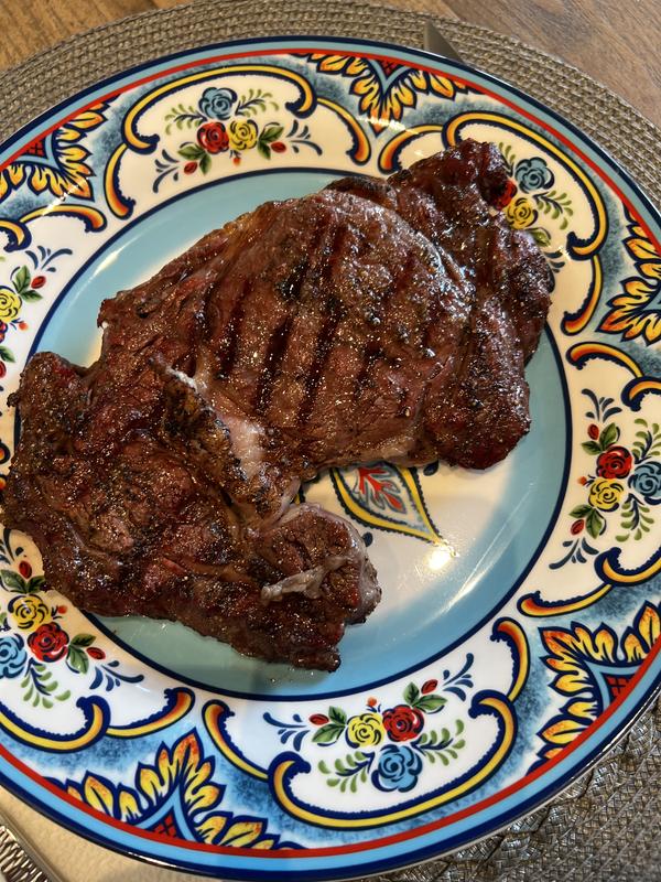 Slow smokes ribeye steads, reverse seared.