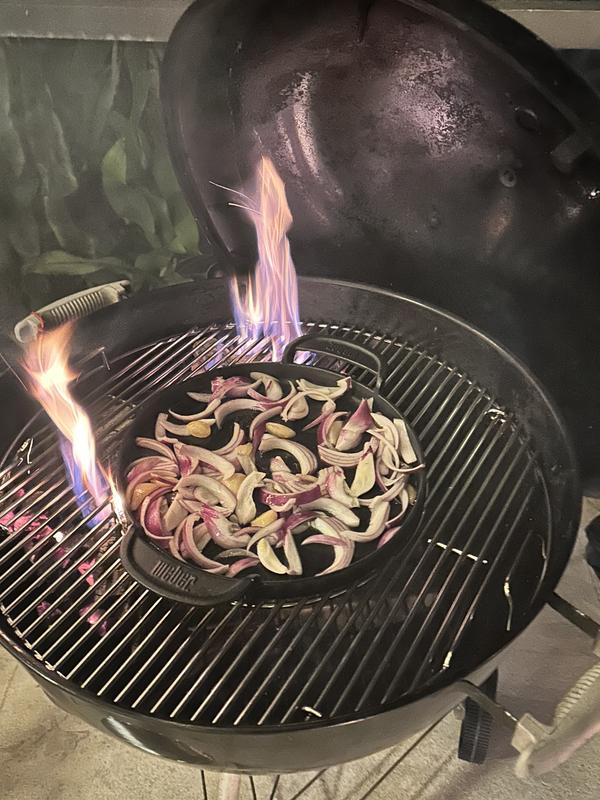 The bed of onions and garlic with a little olive oil, where after I sear my beef, I place the steaks and close the lid. As I get close to 600 degrees - the beef is tender, moist on the inside with the beautiful sear crust outside.