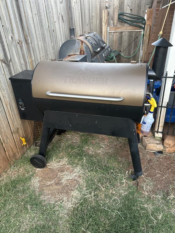 My "Oklahoma Joe's" smoker (in the background) has been replaced